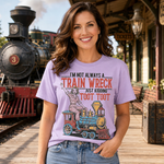 Funny Train Wreck T-Shirt with Retro Locomotive Design and Playful Toot Toot Humor