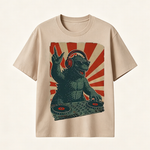 Retro Monster DJ Graphic T-Shirt Featuring a Headphone-Wearing Kaiju Spinning Vinyl Records in Streetwear Style