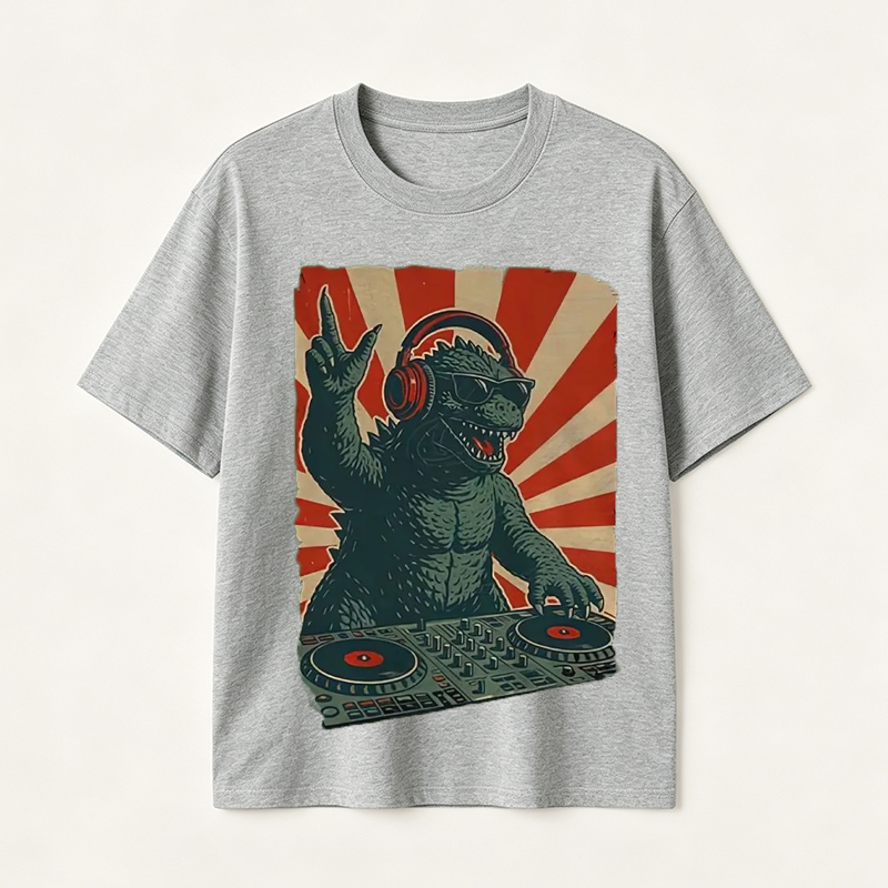 Retro Monster DJ Graphic T-Shirt Featuring a Headphone-Wearing Kaiju Spinning Vinyl Records in Streetwear Style