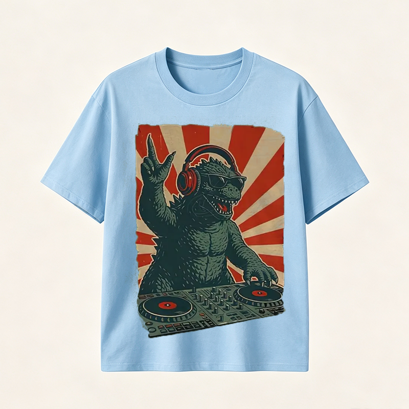 Retro Monster DJ Graphic T-Shirt Featuring a Headphone-Wearing Kaiju Spinning Vinyl Records in Streetwear Style